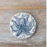Laced with gorgeous blue tentacles, this round Octopus coaster 