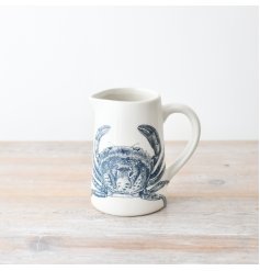 Create a coastal scene in the home with this gorgeous dolomite jug adorned with a blue crab illustration.