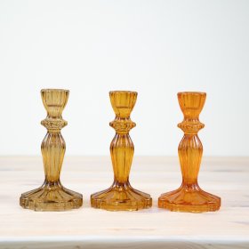 Enhance your home decor with vibrant candle holders that exude elegance for any space.