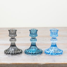 Elevate your space with a touch of color and refinement thanks to these stylish candle holders.