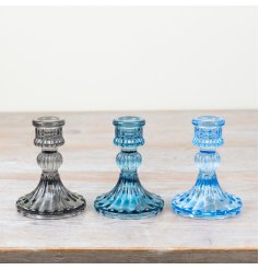 Elevate your decor with these stylish candle holders, featuring a vibrant touch of color and elegance.