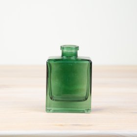 Add a pop of color to your windowsill with this distinctive bottle-shaped vase.
