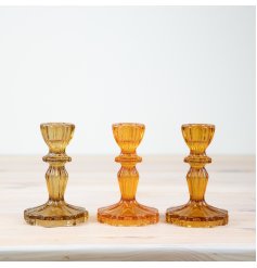 Elevate your decor with our orange boho-inspired candle holders. 