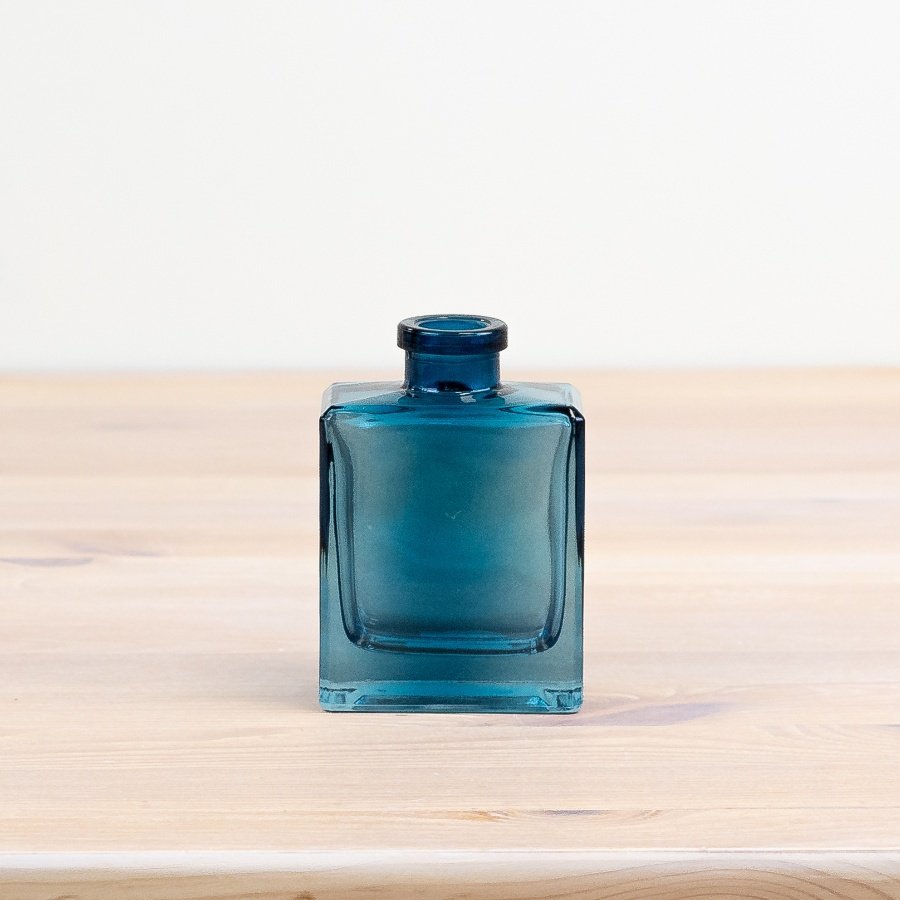 Add style to your space with this versatile blue vase - the perfect statement piece for any room in your home.