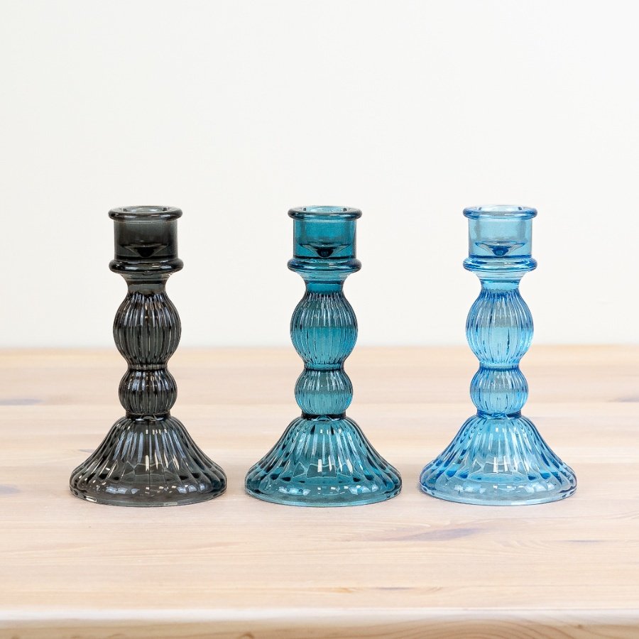 Make a charming addition to your decor with our blue candle holders.  