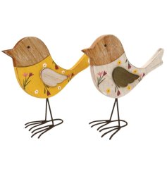 Whimsical wooden bird decor with cheerful charm.