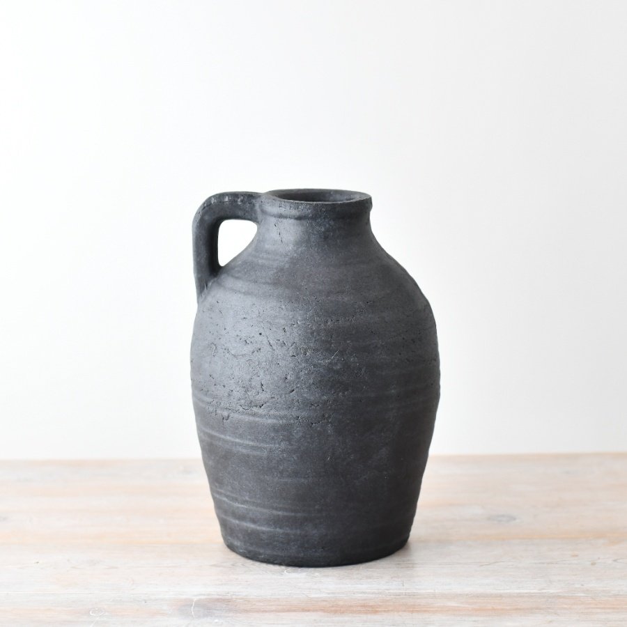 Transform your space with this delightful jug vase for your home decor. 