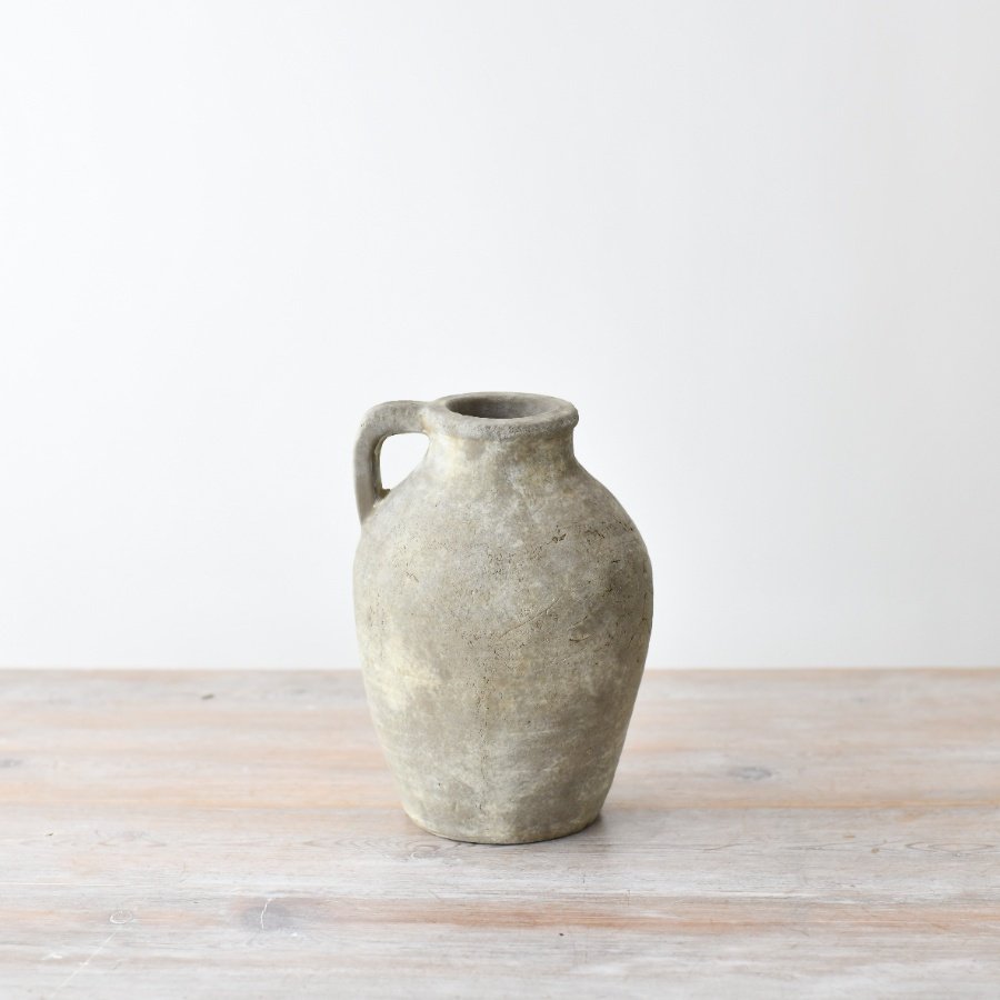 Elevate your interior with this essential accessory. Made from terracotta it boasts a charmingly rustic surface