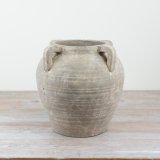 Add a touch of rustic luxury to the home with this statement vase in a natural stone colour