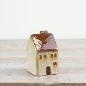 Enjoy a warm glow with this 10cm LED ceramic house decor.