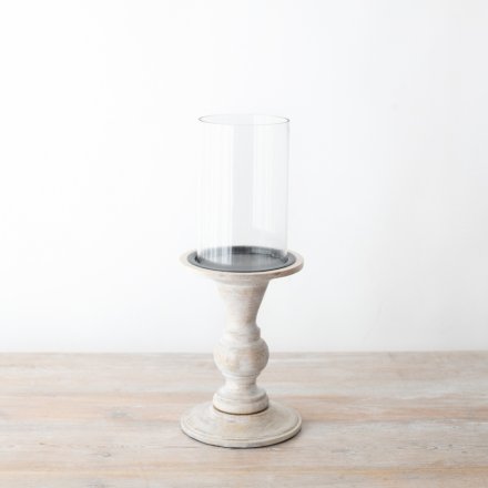 Experience the warmth and elegance of our pillar candle holder 
