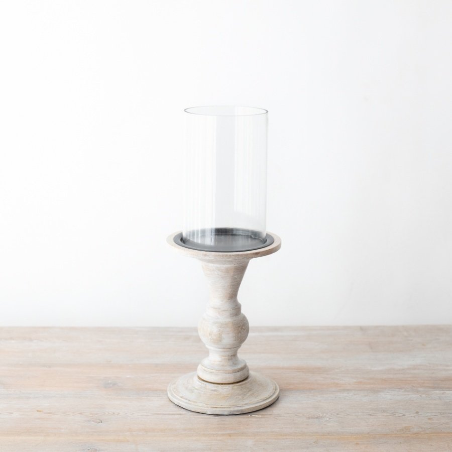 Featuring a stunning blend of warmth and elegance, our pillar candle holder is a must-have for any home.