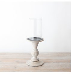 Experience the warmth and elegance of our pillar candle holder 