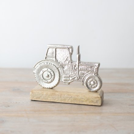Upgrade your collection with our sturdy Tractor On Base, ideal for showcasing or playtime! 