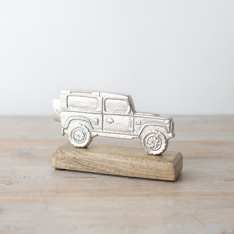 Add some rugged style to your home decor with the Jeep On Base - perfect for revving up any space!