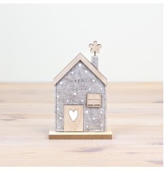 Add a dash of whimsy and warmth to your home with our charming Felt House 
