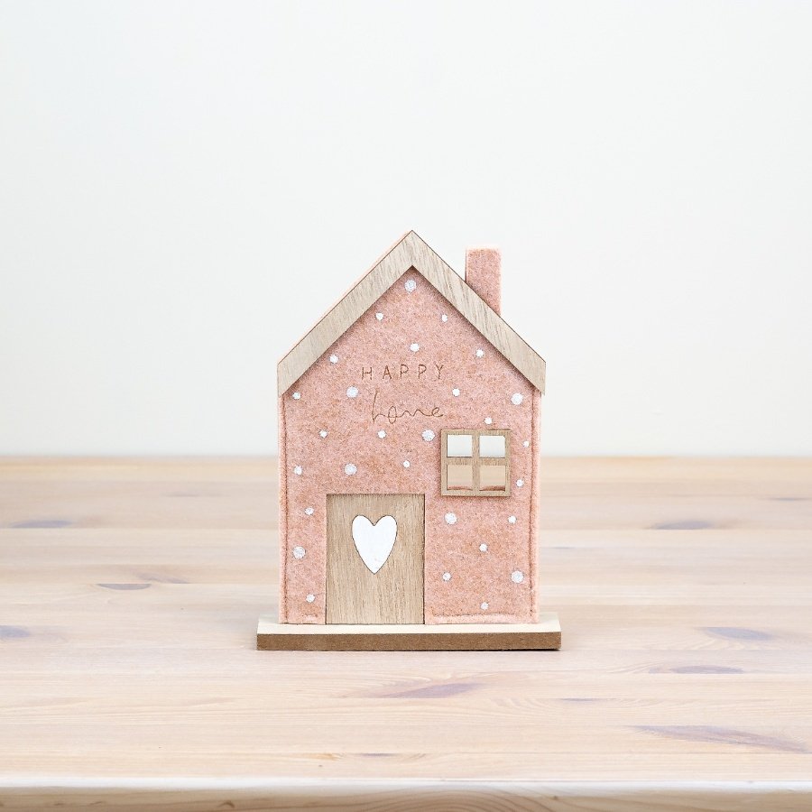 "Bring a touch of charm to your home with this pink felt house