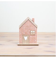 Liven up your space with a charming pink felt house decor. 