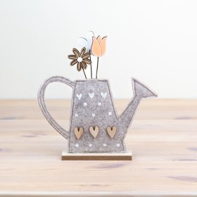 Add charm to any space with this versatile decor for windowsills or shelves.