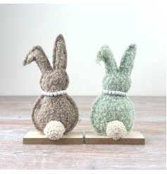 Add these fluffy green and brown sherpa rabbits to your Easter collection today. 