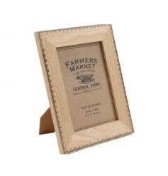 Add a touch of rustic charm with our natural wood photo frame from the general store collection. 