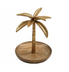 A gorgeous golden palm trinket tray made from wood and metal with a sun kissed palm tree design. 