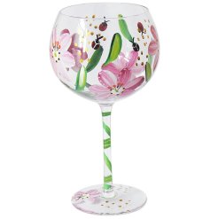 Elevate your go-to drink with a charming touch using this adorable glass.