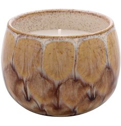 ndulge in the unique beauty and comforting fragrance of our new Reactive Glaze Candle. 