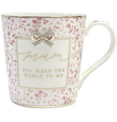 Surprise Mom with a charming Mum You Mean The World To Me Mug. It's the perfect gift to make her day!