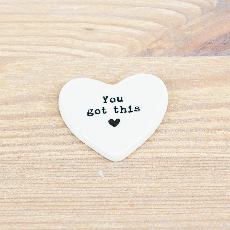 Send some love to a special friend or loved one with this sweet ceramic heart token. 