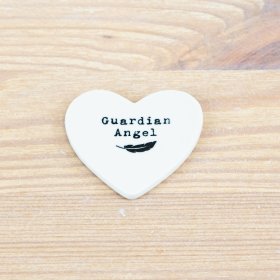 Charming cream heart token with feather design and 'guardian angel' text, adding a sentimental touch.