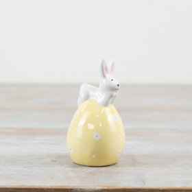 Embrace the spring season with our charming "Bunny On Egg" decoration!