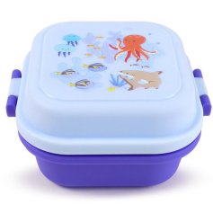 An ocean themed bento lunch box illustrated with coastal child prints. 