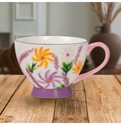 start your morning with beauty and charm using our Sunflower Footed Mug. 