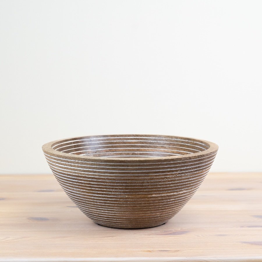 Infuse your kitchen with rustic charm with this delightful bowl.