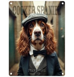 Add charm to your decor with this metal sign featuring a dapper cocker spaniel in a suit and flat cap.