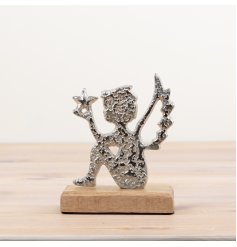A chic angel ornament with a hammered finish. Complete with star detail and mango wood base.
