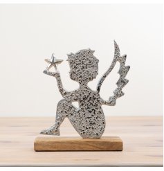 Add a touch of elegance to your holiday decor with our stunning angel silhouette ornament.