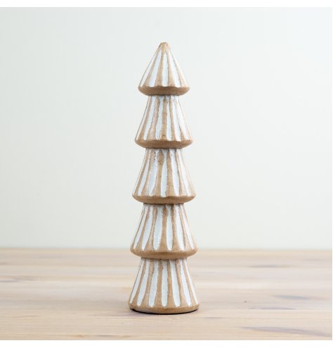 Add texture and tone to your seasonal displays with this hand carved mango wood tree. Complete with a white wash finish.