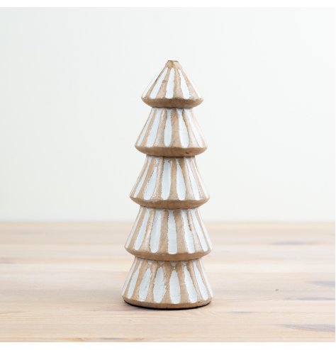 A charming mango wood tree with a carved pattern and white wash finish. 