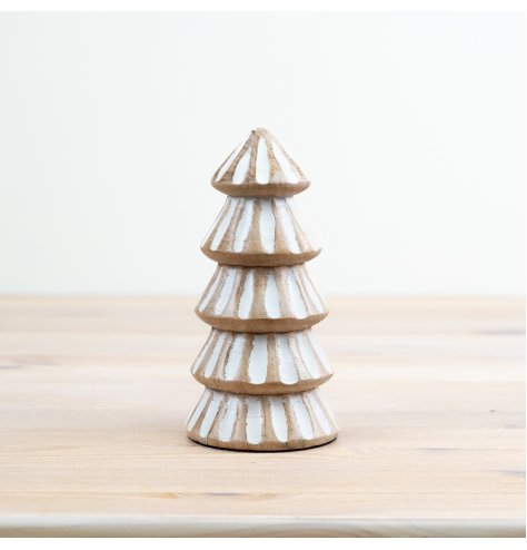 Add texture and style to the home with this charming carved tree. Complete with a white washed finish. 