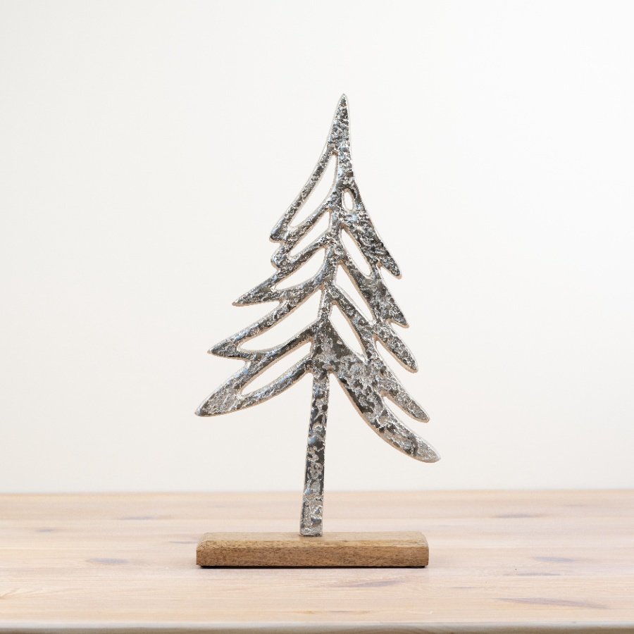 Upgrade your Christmas decor with this elegant silver tree on a wood base for a chic festive display.