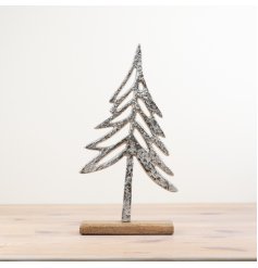 Create a stylish set up this Christmas with this chic silver tree set on a wooden base.