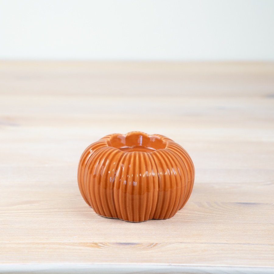 Get into the fall spirit with our pumpkin candle holder! 