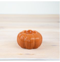 Embrace the cozy vibes of fall with our pumpkin candle holder – the perfect addition to your home decor! 