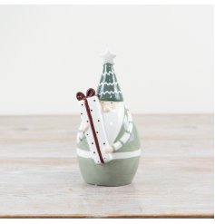 Celebrate the season with our charming 'Green Santa Holding Present' ornament. 