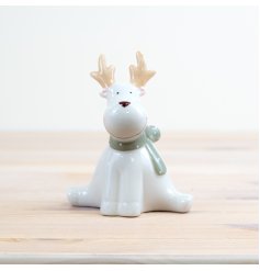Add a touch of magic to your decor with our dolomite reindeer, complete with a cosy scarf.
