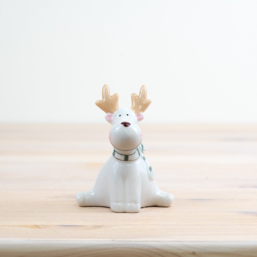 Deck the halls with this adorable reindeer sitting decoration, perfect for adding a touch of Christmas cheer to any h