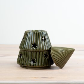 A stunning green-glazed tree oil burner, featuring charming star cutouts. 
