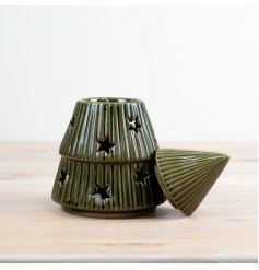 A wonderful green-glazed tree oil burner with star cutouts